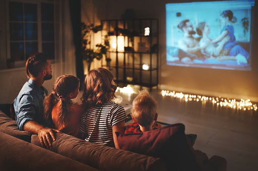 family watching movies at night for the manzanilla sophia blog